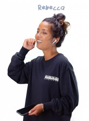 Mylène wearing a headset and smiling